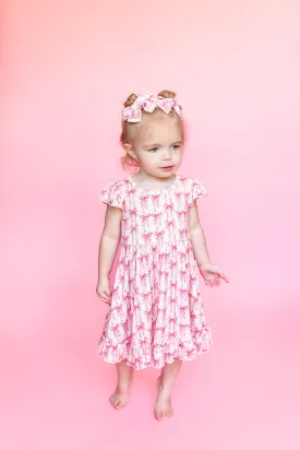 BOW CUTE DREAM RUFFLE DRESS