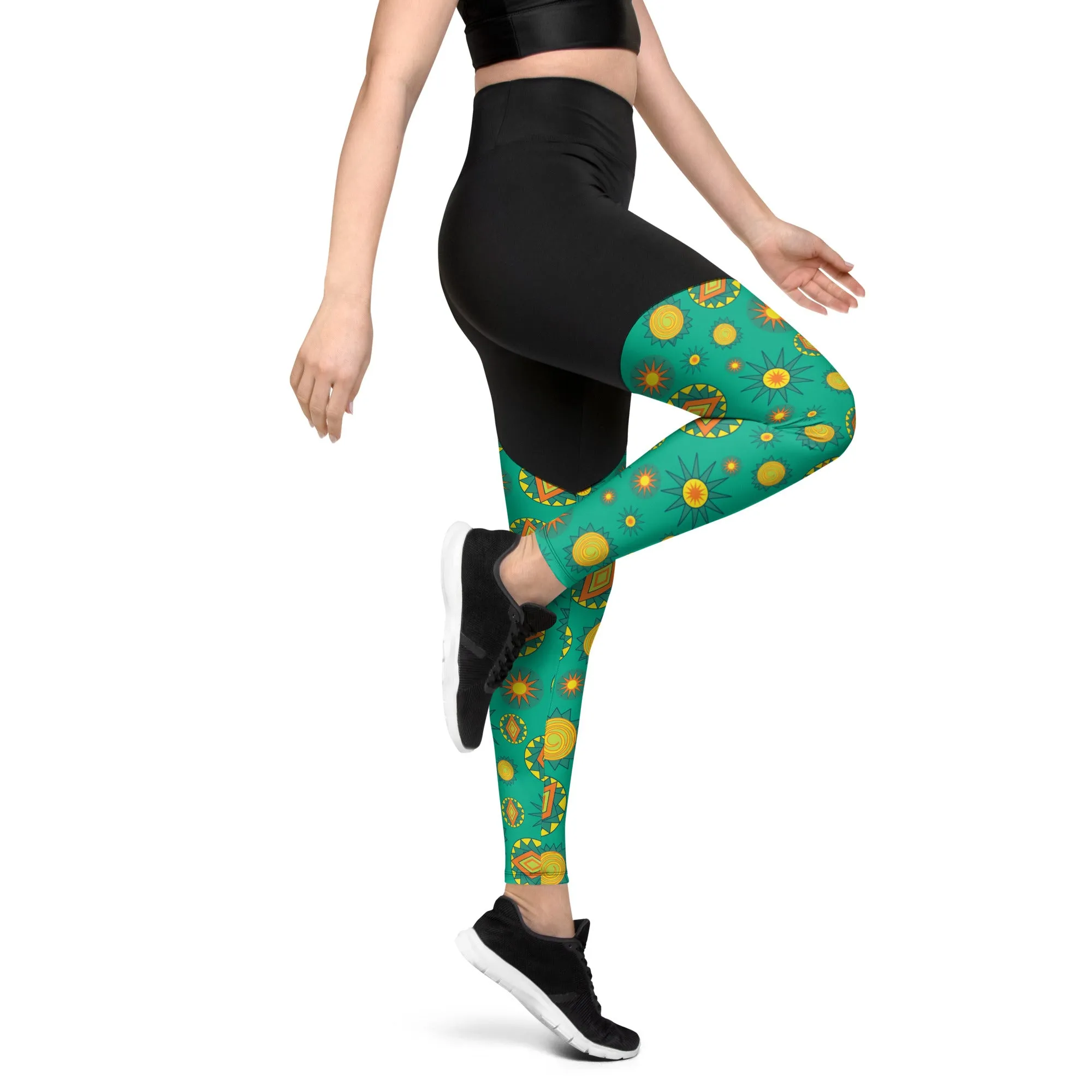 Bursts on green Sports Leggings